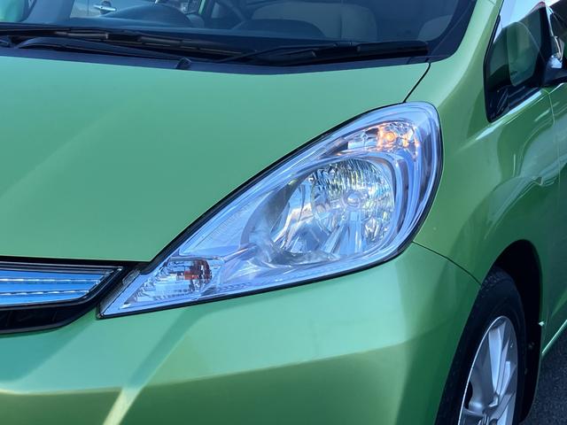 フィットハイブリッド ナビプレミアムセレクション　ハイブリッド　ＥＴＣ　バックカメラ　ナビ　ＴＶ　オートクルーズコントロール　ＨＩＤヘッドライト　スマートキー　電動格納ミラー　シートヒーター　ＣＶＴ　盗難防止システム　アルミホイール　ＣＤ（22枚目）