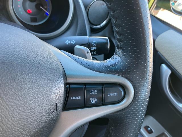 フィットハイブリッド ナビプレミアムセレクション　ハイブリッド　ＥＴＣ　バックカメラ　ナビ　ＴＶ　オートクルーズコントロール　ＨＩＤヘッドライト　スマートキー　電動格納ミラー　シートヒーター　ＣＶＴ　盗難防止システム　アルミホイール　ＣＤ（36枚目）