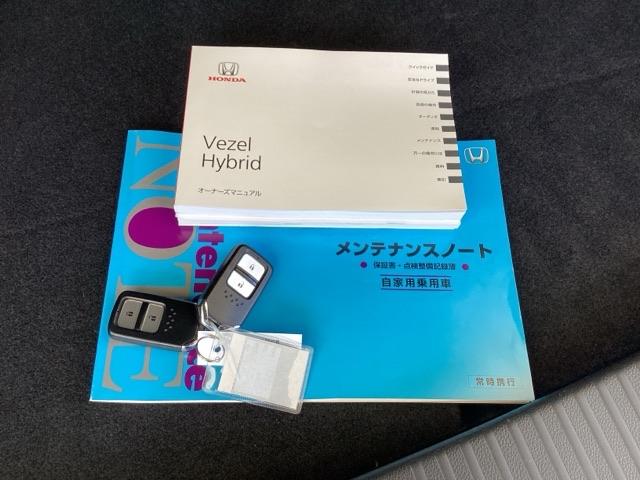 ヴェゼル ハイブリッドＺ・ホンダセンシング　純正メモリーナビ　リアカメラ　ＥＴＣ　レーダーサポート　ＤＶＤ再生機能　整備記録簿　横滑り防止システム　バックアイカメラ　盗難防止装置　フルセ　シートヒーター付　スマ－トキ－　ＥＣＯモード　ＵＳＢ接続（19枚目）
