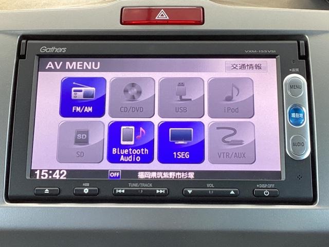 フリードハイブリッド ハイブリッドプレミアムエディション メモリーナビ ETC リアカメラ Rカメ 横滑り防止 両側電動SD DVD キーフリー スマートキーシステム ワンセグ エアコン パワーウィンドウ ナビ&TV 3列シート セキュリティアラーム(11枚目)