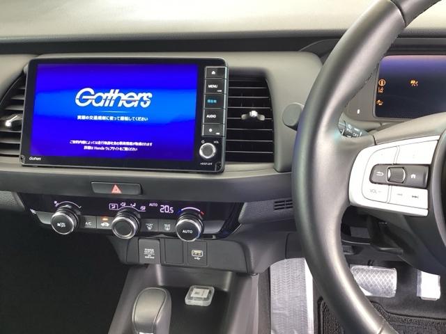 フィット e:HEVホーム 純正メモリーナビ ドラレコ リアカメラ 前後誤発進抑制機能 助手席エアバッグ 運転席エアバッグ アイドリングストップ LEDライト USB接続 バックカメラ ABS サイドエアバッグ フルセグTV(3枚目)