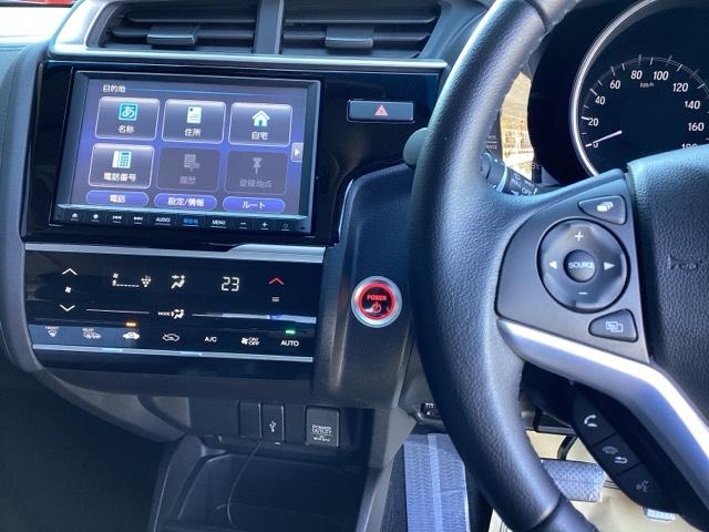 フィットハイブリッド Lホンダセンシング 純正ナビ フルセグ リアカメラ 軽減ブレーキ Rカメ LED サイドSRS 横滑り防止 ナビTV パワーステアリング 盗難防止装置 オートクルーズ ETC車載器 DVD再生 ABS 助手席エアバッグ(2枚目)