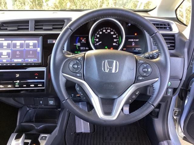 フィットハイブリッド Lホンダセンシング 純正ナビ フルセグ リアカメラ 軽減ブレーキ Rカメ LED サイドSRS 横滑り防止 ナビTV パワーステアリング 盗難防止装置 オートクルーズ ETC車載器 DVD再生 ABS 助手席エアバッグ(16枚目)