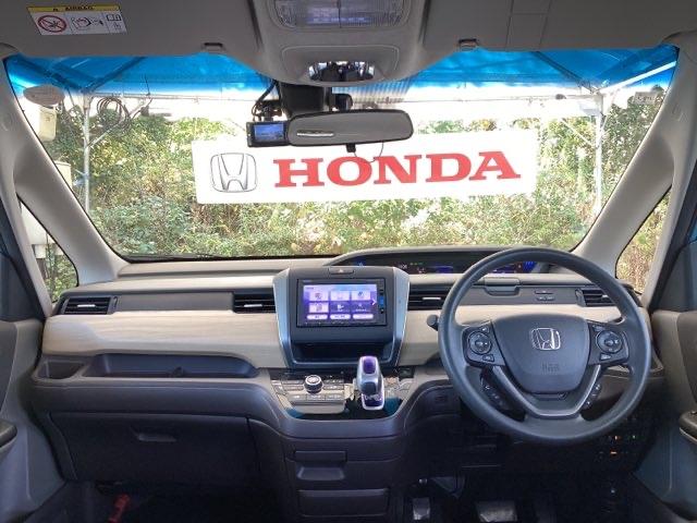 フリードハイブリッド ハイブリッド・Ｇホンダセンシング　メモリーナビ　リアカメラ　ＥＴＣ　軽減ブレーキ　キーフリーシステム　記録簿　ＤＶＤ再生可能　サイドカーテンエアバック　ＥＣＯＮ　後カメラ　Ａクルーズ　地デジフルセグＴＶ　ＬＥＤヘッドランプ　横滑防止（2枚目）