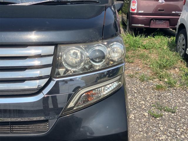 Ｎ－ＢＯＸカスタム Ｇ・Ｌパッケージ　両側スライド・片側電動　ナビ　オートライト　ＨＩＤ　スマートキー　アイドリングストップ　電動格納ミラー　ベンチシート　ＣＶＴ　盗難防止システム　ＡＢＳ　ＥＳＣ　ＣＤ　ＤＶＤ再生　アルミホイール（21枚目）