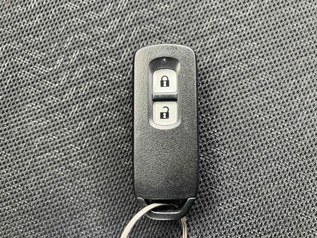 N-BOXカスタム G ETC バックカメラ 両側スライドドア ナビ TV オートライト HID スマートキー アイドリングストップ 電動格納ミラー ベンチシート CVT 盗難防止システム ABS ESC CD DVD再生(11枚目)