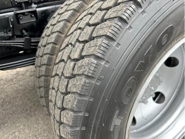 キャンター ターボ　パッカー車　塵芥車　５．１立米　極東製　巻き込み式　排出ダンプ式　ＡＴ車　２ペダル　３．０５ｔ積　バックカメラ　電格ミラー　全面塗装済　車内清掃済　車体サイズ長５５７／幅１９０／高２６２（ｃｍ）（28枚目）