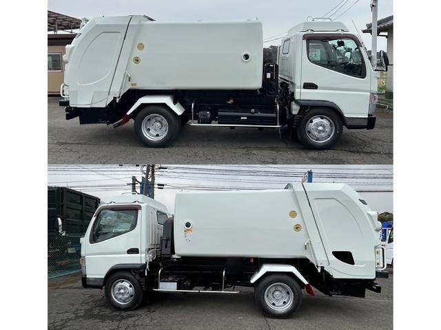キャンター ターボ　パッカー車　塵芥車　５．１立米　極東製　巻き込み式　排出ダンプ式　ＡＴ車　２ペダル　３．０５ｔ積　バックカメラ　電格ミラー　全面塗装済　車内清掃済　車体サイズ長５５７／幅１９０／高２６２（ｃｍ）（33枚目）