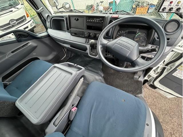 キャンター ターボ　パッカー車　塵芥車　５．１立米　極東製　巻き込み式　排出ダンプ式　ＡＴ車　２ペダル　３．０５ｔ積　バックカメラ　電格ミラー　全面塗装済　車内清掃済　車体サイズ長５５７／幅１９０／高２６２（ｃｍ）（44枚目）