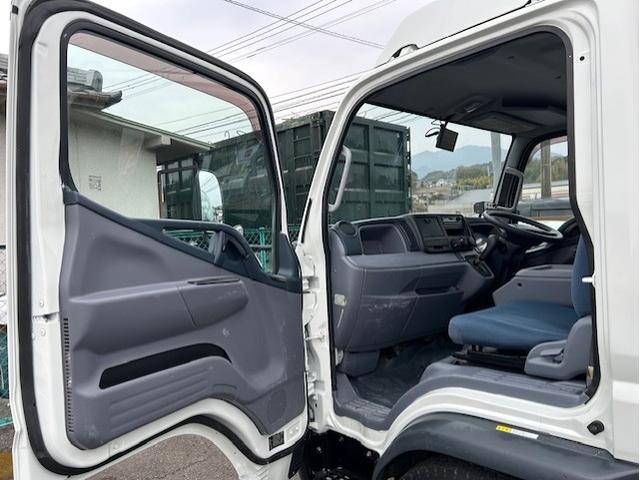 キャンター ターボ　パッカー車　塵芥車　５．１立米　極東製　巻き込み式　排出ダンプ式　ＡＴ車　２ペダル　３．０５ｔ積　バックカメラ　電格ミラー　全面塗装済　車内清掃済　車体サイズ長５５７／幅１９０／高２６２（ｃｍ）（54枚目）