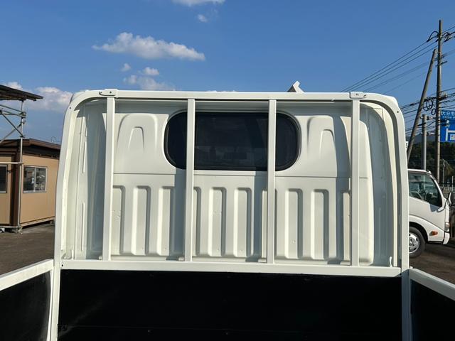 キャンターガッツ 　ダブルキャブ　１．２５ｔ積　６人乗り　４ナンバー　低床　２．９５Ｌディーゼルターボ　ＭＴ５速　キーレス　全面塗装済　電格ミラー　荷台内寸　長２０７／幅１６２／高３７（11枚目）