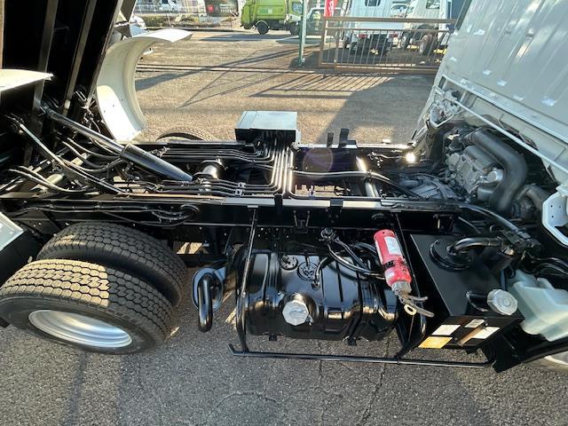 エルフトラック 　モリタ製　２ｔ積　５．０立米　巻き込み式　排出ダンプ式　パッカー車　積み込み連続スイッチ　汚水タンク　ＭＴ６速　電格ミラー　２．９９Ｌ　ディーゼルターボ　全面塗装済　走行２１．１万キロ（36枚目）