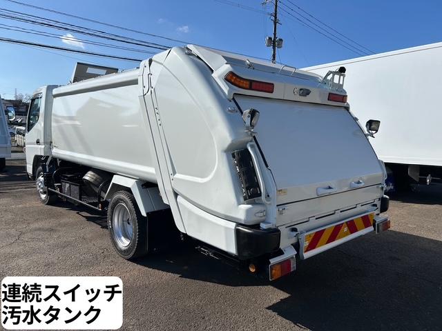 キャンター 　ワイド　プレスパッカー　６．８立米　新明和　排出押し出し式　２．９ｔ積　汚水タンク　連続スイッチ　バックカメラ　全面塗装済　５速ＭＴ（34枚目）