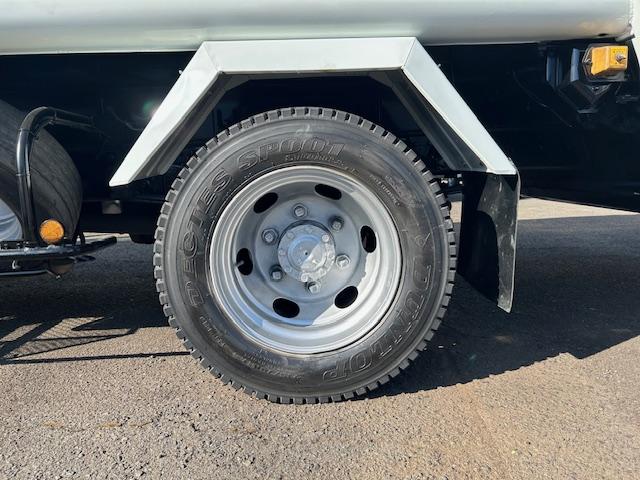 キャンター 　ワイド　プレスパッカー　６．８立米　新明和　排出押し出し式　２．９ｔ積　汚水タンク　連続スイッチ　バックカメラ　全面塗装済　５速ＭＴ（47枚目）