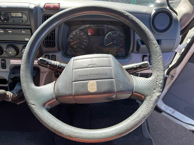 キャンター 　ワイド　プレスパッカー　６．８立米　新明和　排出押し出し式　２．９ｔ積　汚水タンク　連続スイッチ　バックカメラ　全面塗装済　５速ＭＴ（59枚目）