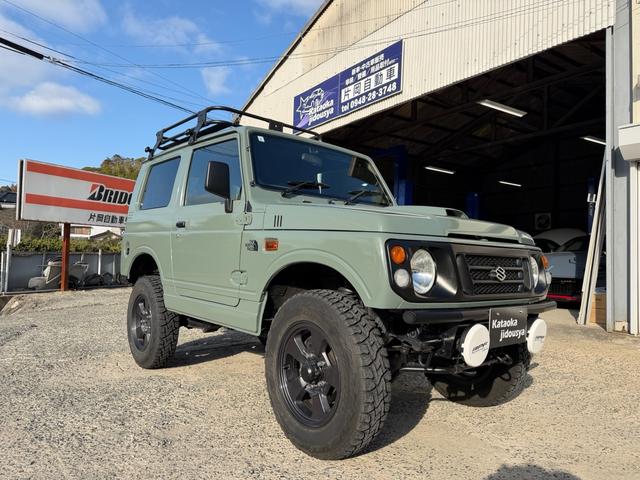 ジムニー ワイルドウインド　５速マニュアル・４ＷＤ・ＥＴＣ・リフトアップ・ルーフラック・ＭＯＭＯステアリング・ケスウィックグリーン（6枚目）