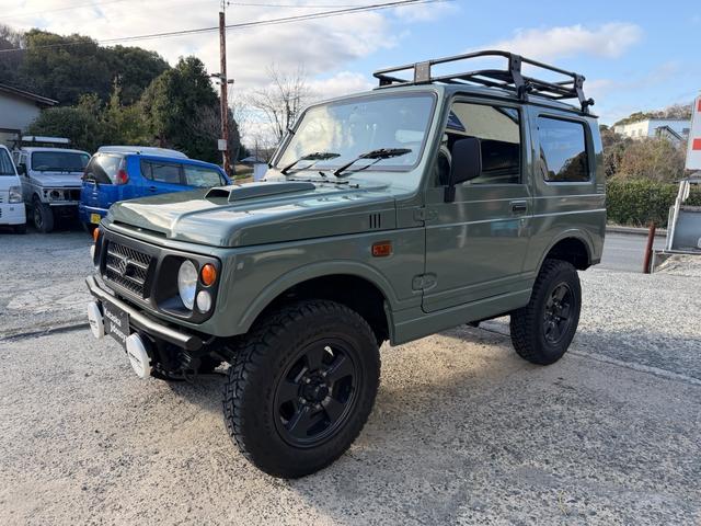 ジムニー ワイルドウインド　５速マニュアル・４ＷＤ・ＥＴＣ・リフトアップ・ルーフラック・ＭＯＭＯステアリング・ケスウィックグリーン（7枚目）