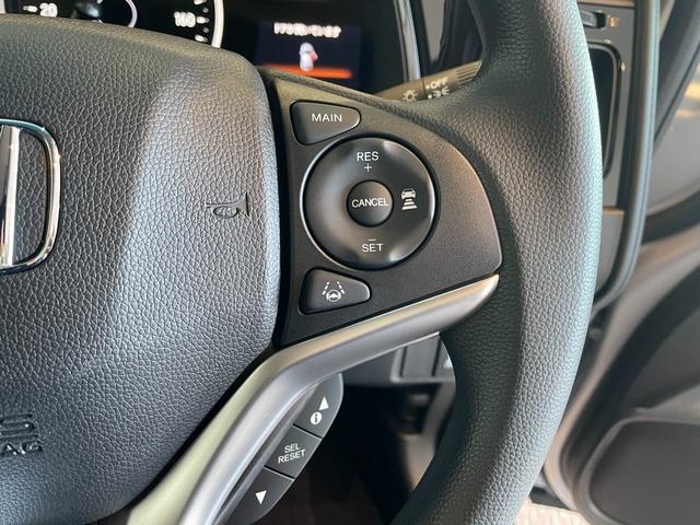 シャトル ハイブリッド　ホンダセンシング　ＥＴＣ　バックカメラ　ナビ　ＢＴ　オートクルーズコントロール　レーンアシスト　衝突被害軽減システム　オートライト　スマートキー　Ｐスタート　アイドリングストップ　電動格納ミラー　社外前後センサー（14枚目）