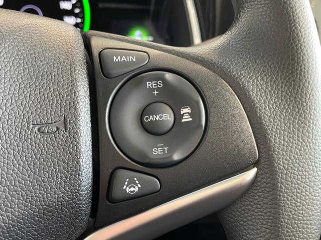 シャトル ハイブリッド　ホンダセンシング　ＥＴＣ　バックカメラ　ナビ　オートクルーズコントロール　レーンアシスト　衝突被害軽減システム　オートライト　スマートキー　電動格納ミラー　ＡＴ　盗難防止システム　衝突安全ボディ　ＡＢＳ　ＥＳＣ（14枚目）
