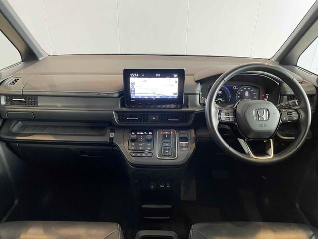 ステップワゴン e:HEVスパーダ CMBS レーンキープ BSI Pセンサー ACC 両側パワスラ LEDヘッド フォグ 純正16アルミ デュアルAAC シートヒーター Pバックドア 純正ナビ フルセグTV BT バックカメラ(3枚目)