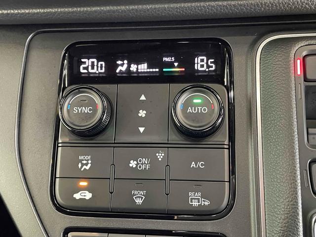 ステップワゴン e:HEVスパーダ CMBS レーンキープ BSI Pセンサー ACC 両側パワスラ LEDヘッド フォグ 純正16アルミ デュアルAAC シートヒーター Pバックドア 純正ナビ フルセグTV BT バックカメラ(37枚目)