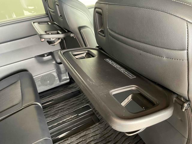 ステップワゴン e:HEVスパーダ CMBS レーンキープ BSI Pセンサー ACC 両側パワスラ LEDヘッド フォグ 純正16アルミ デュアルAAC シートヒーター Pバックドア 純正ナビ フルセグTV BT バックカメラ(64枚目)