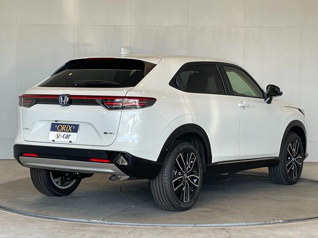 ヴェゼル ｅ：ＨＥＶ　Ｚ　登録済未使用車　純正ナビ　フルセグＴＶ　ＢＴ　バックカメラ　ＣＭＢＳ　レーンキープ　ＢＳＭ　Ｐセンサー　ＡＣＣ　Ｐバックドア　ＬＥＤヘッド　純正１８アルミ　スマートキー　デュアルＡＡＣ　ＬＥＤヘッド（2枚目）