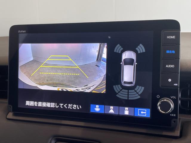 ヴェゼル ｅ：ＨＥＶ　Ｚ　登録済未使用車　純正ナビ　フルセグＴＶ　ＢＴ　バックカメラ　ＣＭＢＳ　レーンキープ　ＢＳＭ　Ｐセンサー　ＡＣＣ　Ｐバックドア　ＬＥＤヘッド　純正１８アルミ　スマートキー　デュアルＡＡＣ　ＬＥＤヘッド（10枚目）