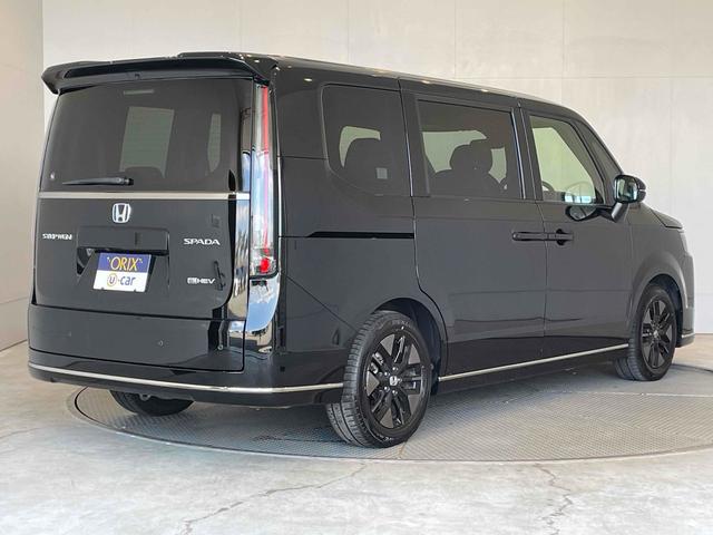 ステップワゴン e:HEVスパーダ CMBS レーンキープ BSI Pセンサー ACC 両側パワスラ LEDヘッド フォグ 純正16アルミ デュアルAAC シートヒーター Pバックドア 純正ナビ フルセグTV BT バックカメラ(2枚目)