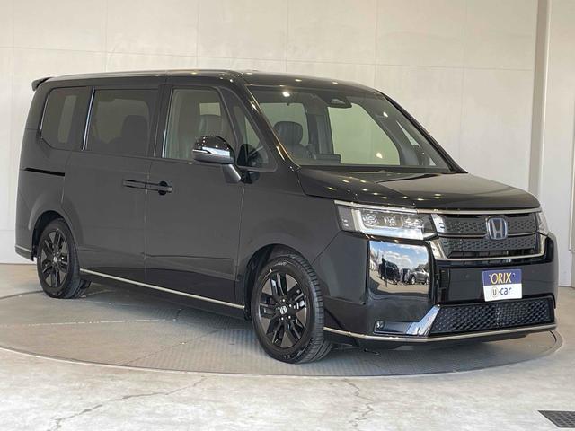 ステップワゴン e:HEVスパーダ CMBS レーンキープ BSI Pセンサー ACC 両側パワスラ LEDヘッド フォグ 純正16アルミ デュアルAAC シートヒーター Pバックドア 純正ナビ フルセグTV BT バックカメラ(27枚目)