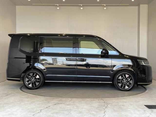 ステップワゴン e:HEVスパーダ CMBS レーンキープ BSI Pセンサー ACC 両側パワスラ LEDヘッド フォグ 純正16アルミ デュアルAAC シートヒーター Pバックドア 純正ナビ フルセグTV BT バックカメラ(30枚目)