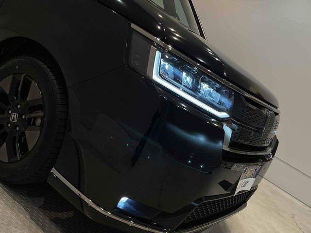 ステップワゴン e:HEVスパーダ CMBS レーンキープ BSI Pセンサー ACC 両側パワスラ LEDヘッド フォグ 純正16アルミ デュアルAAC シートヒーター Pバックドア 純正ナビ フルセグTV BT バックカメラ(31枚目)