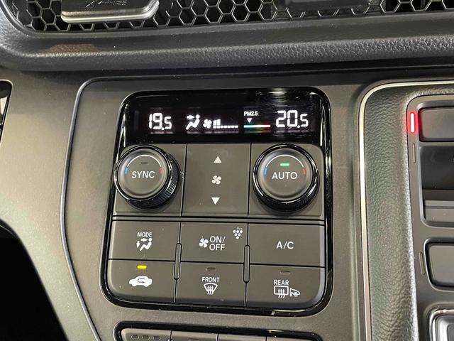 ステップワゴン e:HEVスパーダ CMBS レーンキープ BSI Pセンサー ACC 両側パワスラ LEDヘッド フォグ 純正16アルミ デュアルAAC シートヒーター Pバックドア 純正ナビ フルセグTV BT バックカメラ(33枚目)