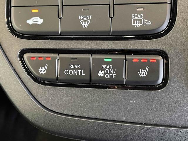 ステップワゴン e:HEVスパーダ CMBS レーンキープ BSI Pセンサー ACC 両側パワスラ LEDヘッド フォグ 純正16アルミ デュアルAAC シートヒーター Pバックドア 純正ナビ フルセグTV BT バックカメラ(34枚目)