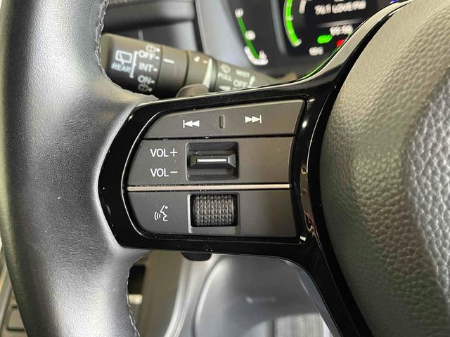 ステップワゴン e:HEVスパーダ CMBS レーンキープ BSI Pセンサー ACC 両側パワスラ LEDヘッド フォグ 純正16アルミ デュアルAAC シートヒーター Pバックドア 純正ナビ フルセグTV BT バックカメラ(35枚目)