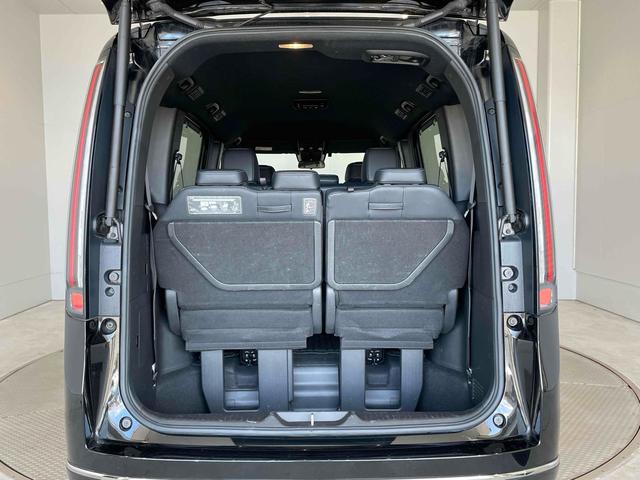 ステップワゴン e:HEVスパーダ CMBS レーンキープ BSI Pセンサー ACC 両側パワスラ LEDヘッド フォグ 純正16アルミ デュアルAAC シートヒーター Pバックドア 純正ナビ フルセグTV BT バックカメラ(65枚目)