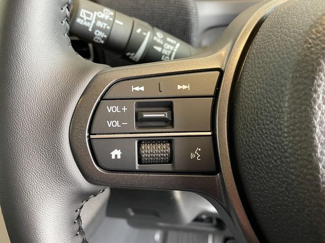 フリード ｅ：ＨＥＶエアー　ＥＸ　登録済未使用車　純正ナビ　フルセグＴＶ　ＢＴ　マルチビューカメラシステム　ＣＭＢＳ　Ｐセンサー　ＢＳＩ　ＡＣＣ　レーンキープ　両側パワスラ　ＡＡＣ　リアＡＣ　シートヒーター　ＬＥＤヘッド　純正１５ＡＷ（34枚目）