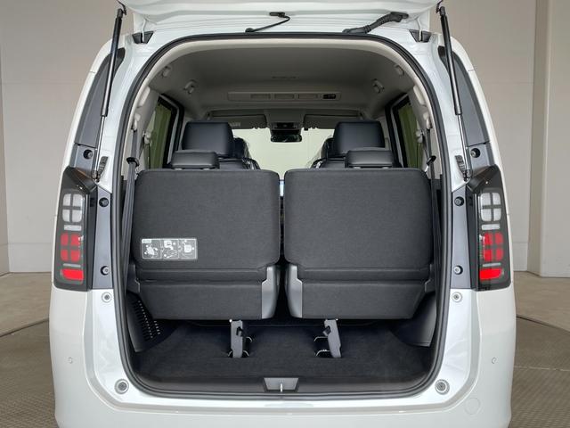 フリード ｅ：ＨＥＶエアー　ＥＸ　登録済未使用車　純正ナビ　フルセグＴＶ　ＢＴ　マルチビューカメラシステム　ＣＭＢＳ　Ｐセンサー　ＢＳＩ　ＡＣＣ　レーンキープ　両側パワスラ　ＡＡＣ　リアＡＣ　シートヒーター　ＬＥＤヘッド　純正１５ＡＷ（56枚目）