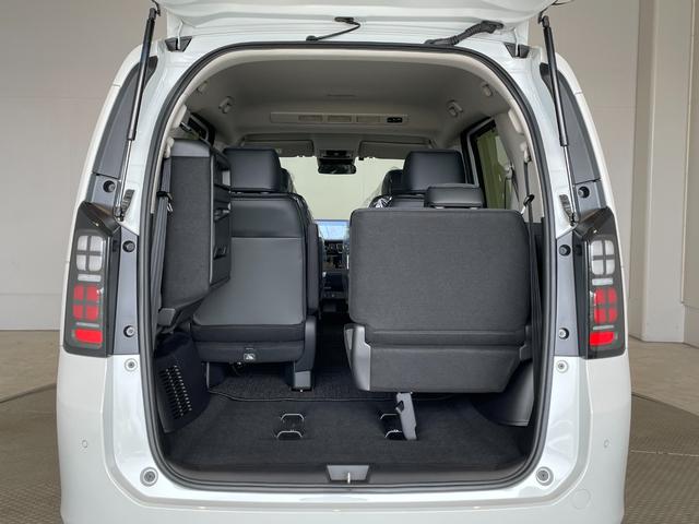 フリード ｅ：ＨＥＶエアー　ＥＸ　登録済未使用車　純正ナビ　フルセグＴＶ　ＢＴ　マルチビューカメラシステム　ＣＭＢＳ　Ｐセンサー　ＢＳＩ　ＡＣＣ　レーンキープ　両側パワスラ　ＡＡＣ　リアＡＣ　シートヒーター　ＬＥＤヘッド　純正１５ＡＷ（57枚目）