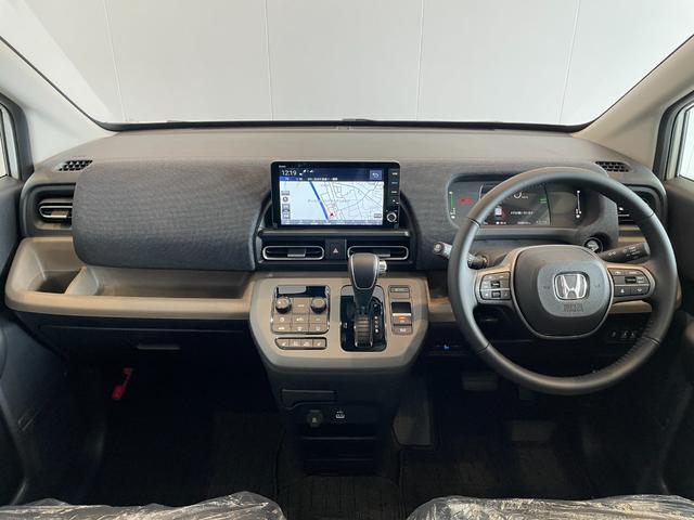 フリード e:HEVエアー EX 登録済未使用車 純正ナビ フルセグTV BT マルチビューカメラシステム CMBS Pセンサー BSI ACC レーンキープ 両側パワスラ AAC リアAC シートヒーター LEDヘッド 純正15AW(3枚目)