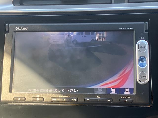 フィット １３Ｇ・Ｆパッケージ　バックカメラ　ナビ　スマートキー　アイドリングストップ　電動格納ミラー　ＣＶＴ　盗難防止システム　衝突安全ボディ　ＡＢＳ　ＥＳＣ　ＣＤ　ＵＳＢ　ミュージックプレイヤー接続可　エアコン（5枚目）