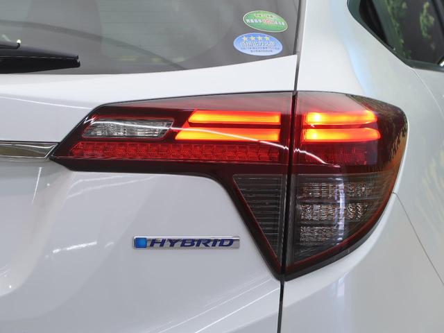ハイブリッドZ・ホンダセンシング 純正8型ナビ ホンダセンシング/レーダークルーズ 禁煙車 LEDヘッド/フォグ バックカメラ ハーフレザー/シートヒーター Bluetooth接続 左右独立オートエアコン 純正17AW(30枚目)