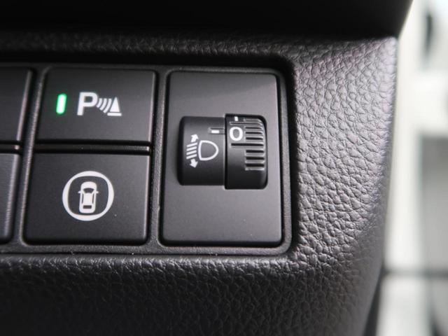 e:HEV X 登録済未使用車 現行型 ホンダセンシング レーダークルーズ 誤発進抑制 コーナーセンサー レーンアシスト LEDヘッド オートハイビーム バックカメラ 純正16AW パドルシフト スマートキー(38枚目)