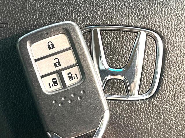 スパーダハイブリッド G・EX ホンダセンシング 禁煙車 7人乗り 純正9型ナビ 全周囲カメラ Bluetooth接続 両側電動ドア 衝突軽減 レーダークルーズ シートヒーター LEDヘッド&フォグランプ 半革シート レーンアシスト 純正16AW(61枚目)