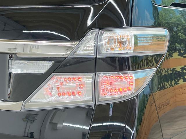 2.4Z ゴールデンアイズ 禁煙車 サンルーフ 純正8型ナビ フリップダウンモニター 両側電動ドア バックカメラ フルセグTV ETC コーナーセンサー HIDヘッド クルーズコントロール ウッドコンビステリング オットマン(29枚目)