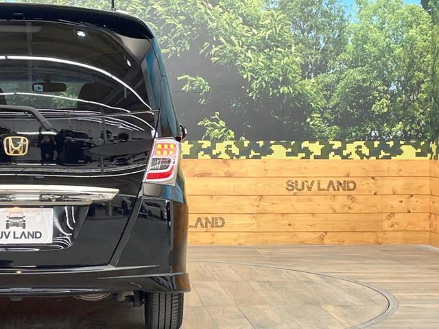 G エアロ クールエディション 禁煙車 純正SDナビ バックカメラ 電動スライドドア Bluetooth再生 ETC ハーフレザーシート HIDヘッドライト 革巻きステアリング 純正15インチAW DVD再生 地デジ オートライト(27枚目)