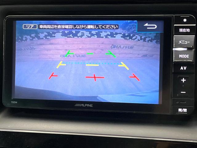 ヴォクシー Ｖ　禁煙車　純正ナビ　バックカメラ　フリップダウンモニター　クルーズコントロール　片側パワースライドドア　ＬＥＤヘッド　ＥＴＣ　オートマチックハイビーム　純正１５インチアルミ（4枚目）