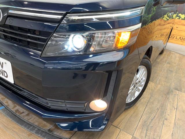 ヴォクシー Ｖ　禁煙車　純正ナビ　バックカメラ　フリップダウンモニター　クルーズコントロール　片側パワースライドドア　ＬＥＤヘッド　ＥＴＣ　オートマチックハイビーム　純正１５インチアルミ（13枚目）