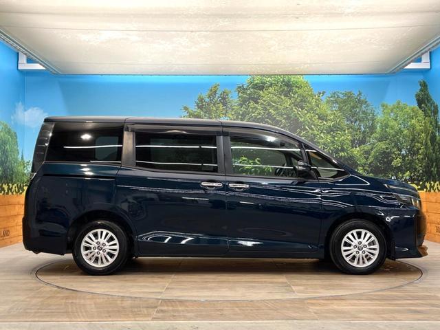 ヴォクシー Ｖ　禁煙車　純正ナビ　バックカメラ　フリップダウンモニター　クルーズコントロール　片側パワースライドドア　ＬＥＤヘッド　ＥＴＣ　オートマチックハイビーム　純正１５インチアルミ（25枚目）