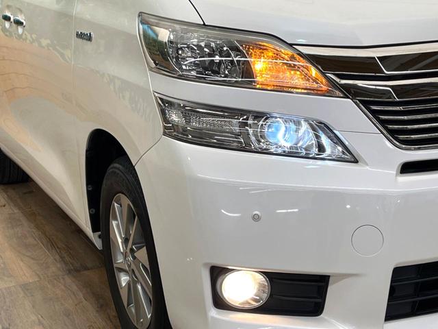 ヴェルファイアハイブリッド Ｘ　禁煙車　８インチナビ　４ＷＤ　バックカメラ　フリップダウンモニター　両側電動スライドドア　ＥＴＣ　クリアランスソナー　衝突安全ボディ　横滑り防止　オートライト　純正１６インチアルミ（13枚目）